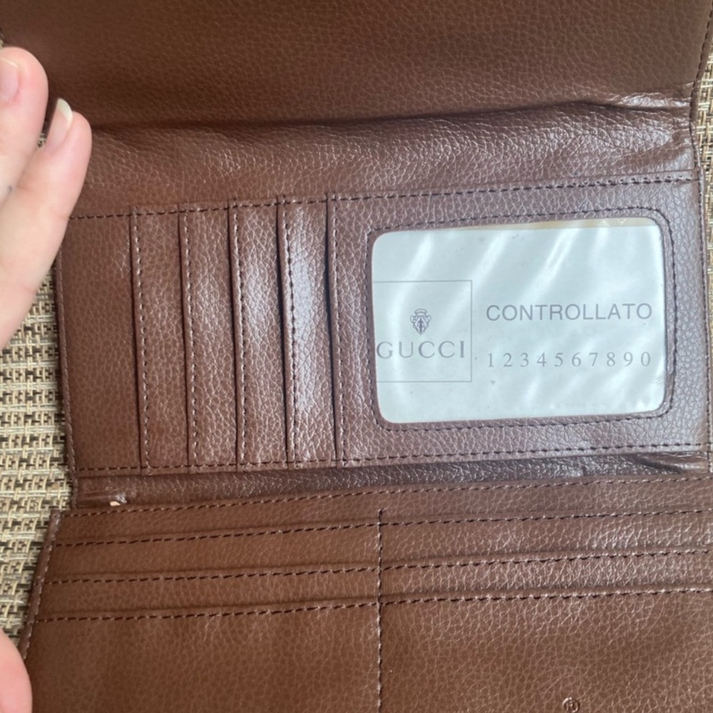 Brown Embossed Wallet with Silver Accent
Fashion - Picture 3 of 4